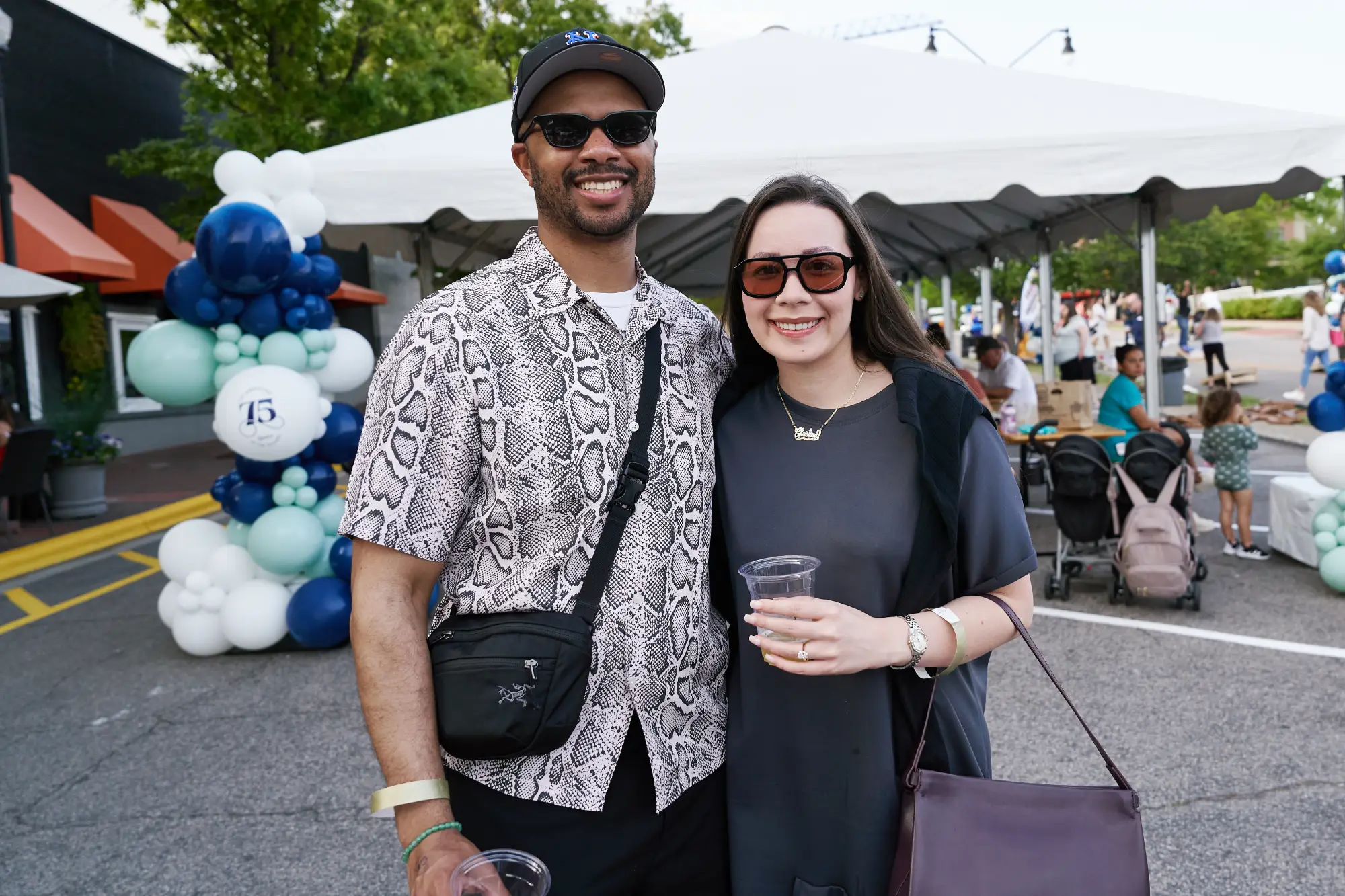 a couple smiling at the camera