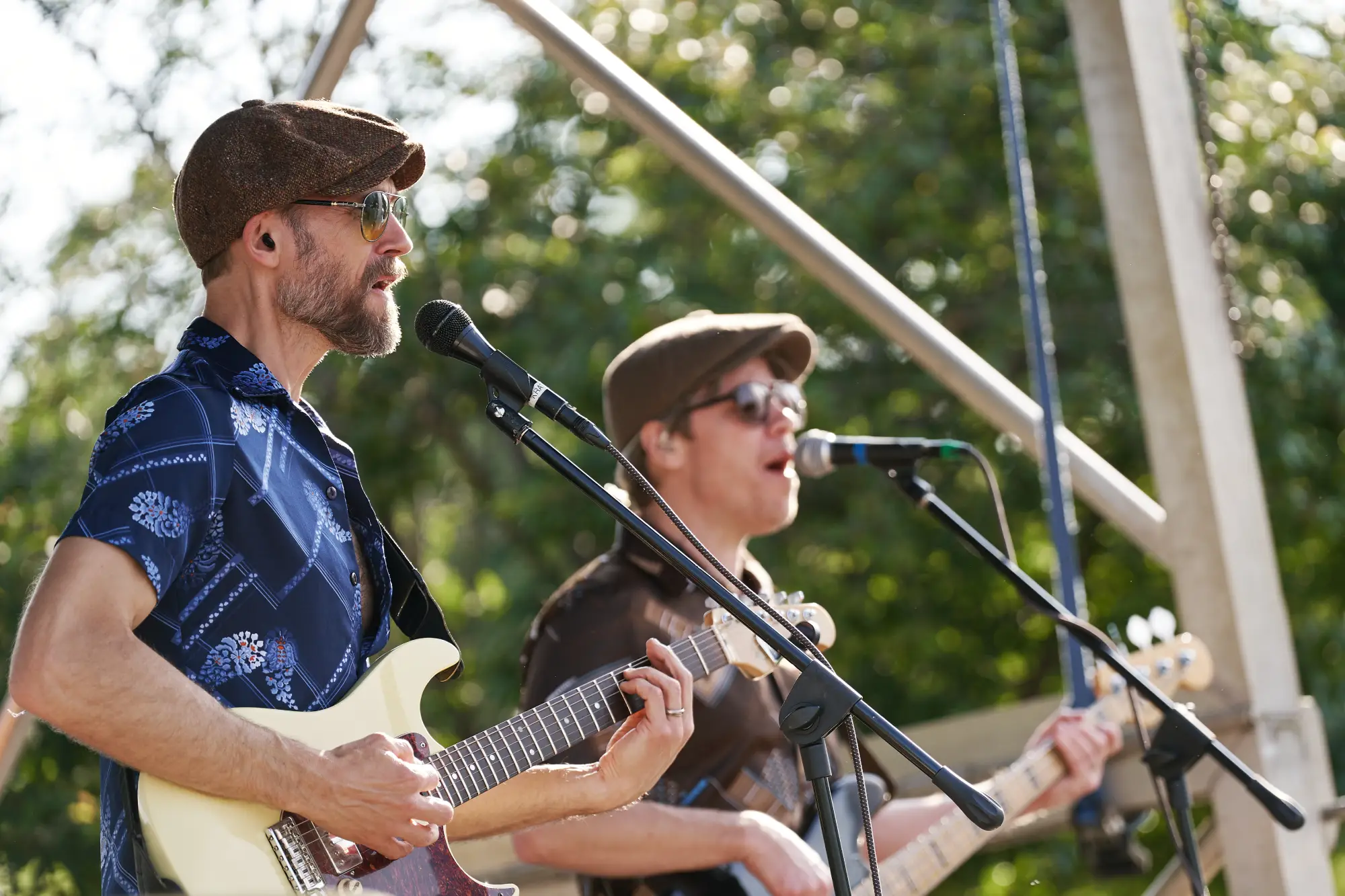 two men performing at Village District 75th Anniversary Celebration