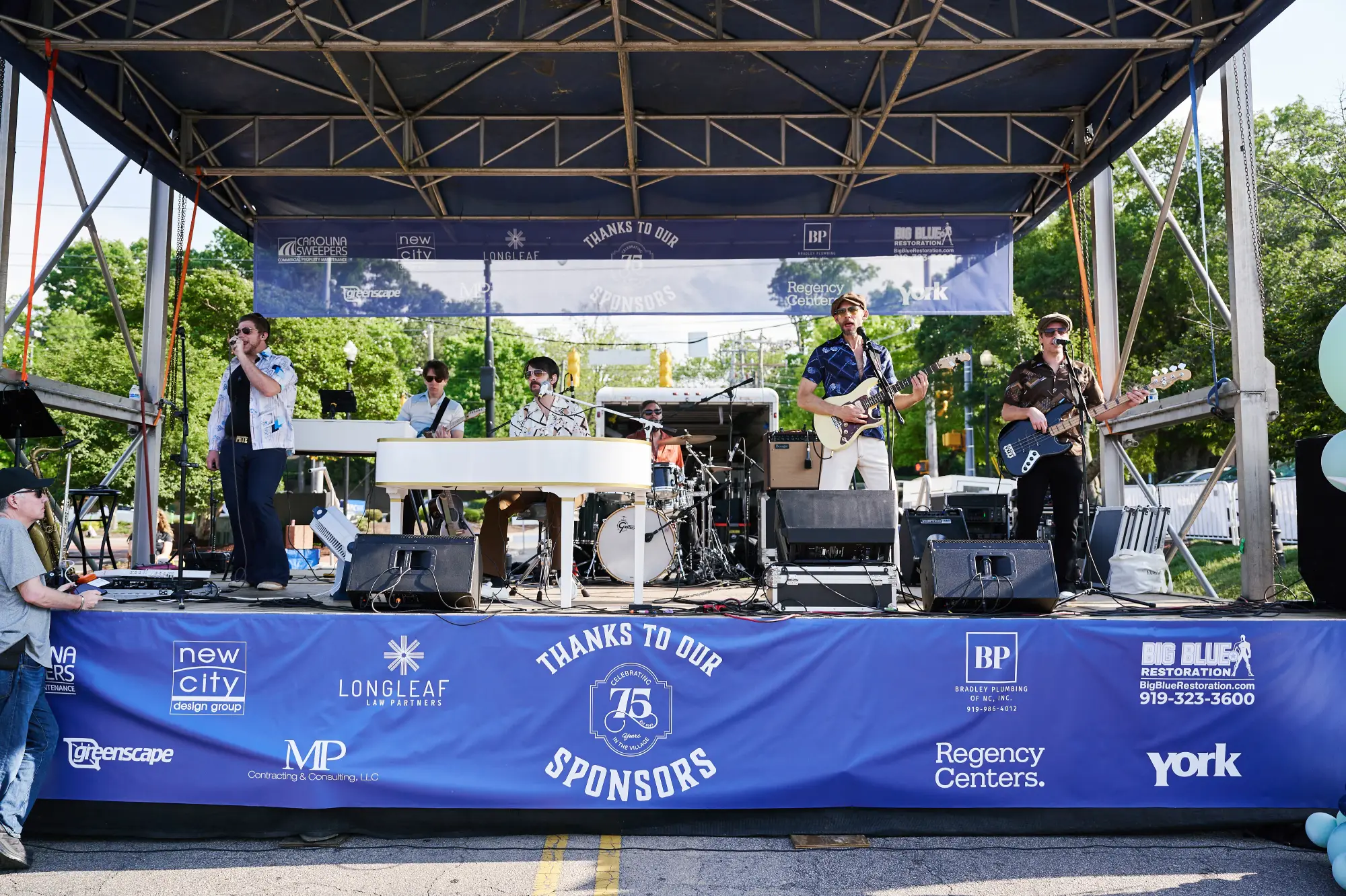 Band playing at Village District 75th Anniversary Celebration
